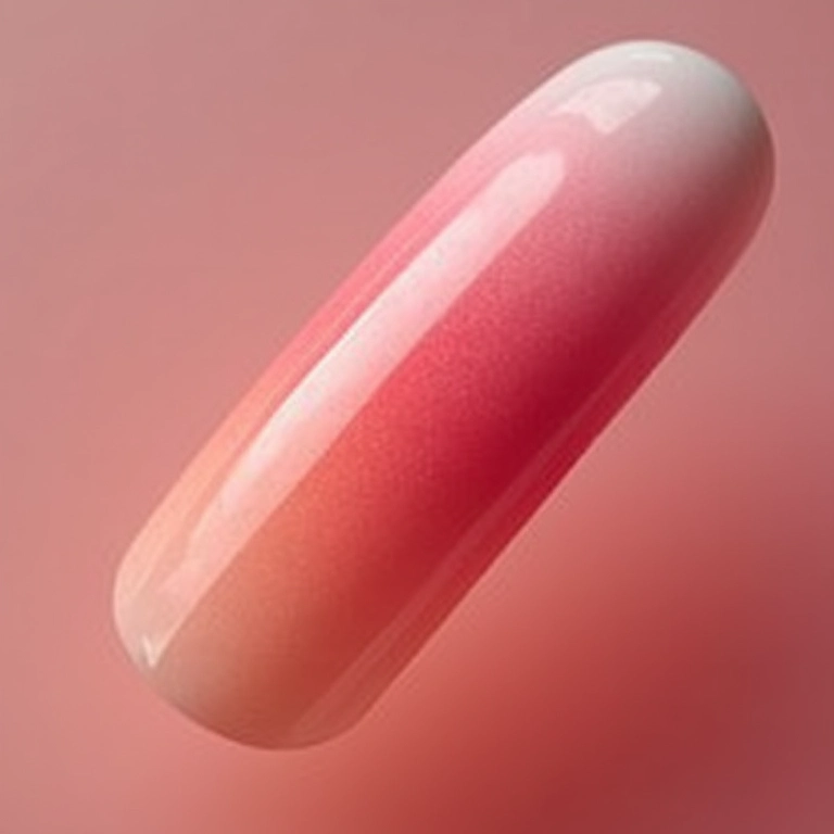 Unhas com efeito ombré suave.