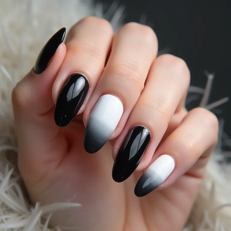 Unhas de gel preta e branca com efeito degradê.