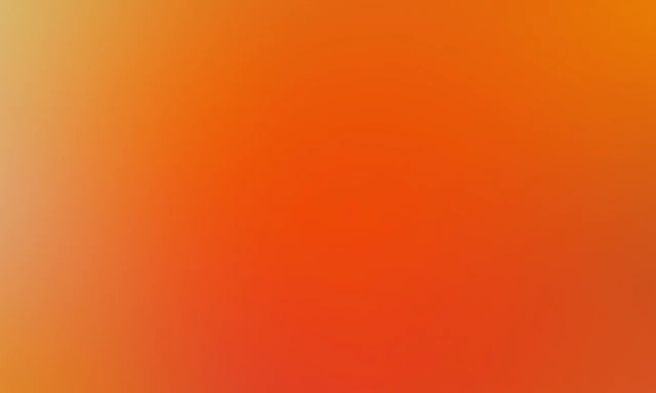 Unhas degradê laranja do sol ao neon.