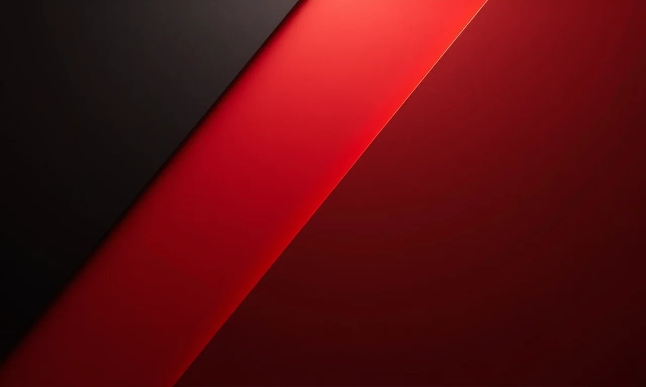 Unhas vermelhas e pretas, contraste marcante e moderno.