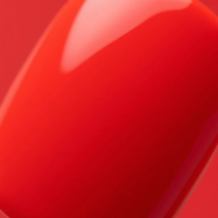 Close up extremo de unhas vermelhas foscas