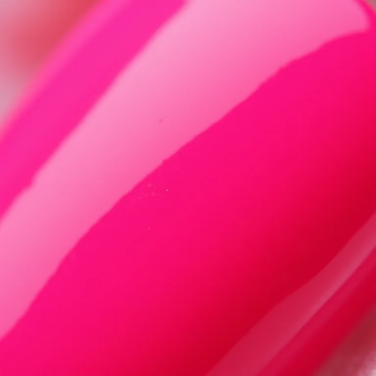 Detalhe macro de esmalte neon rosa