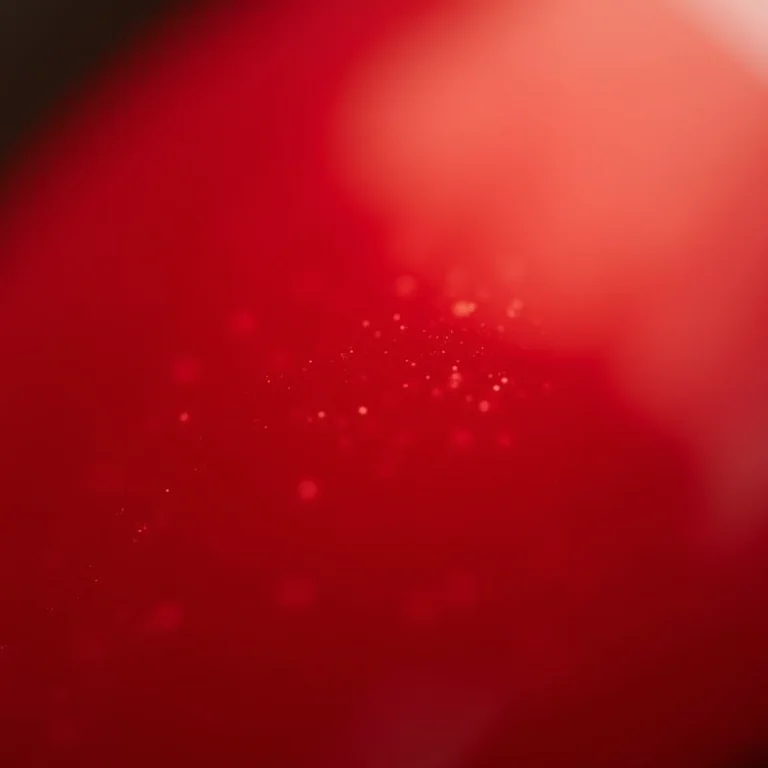 Unhas vermelho metalizado com brilho intenso