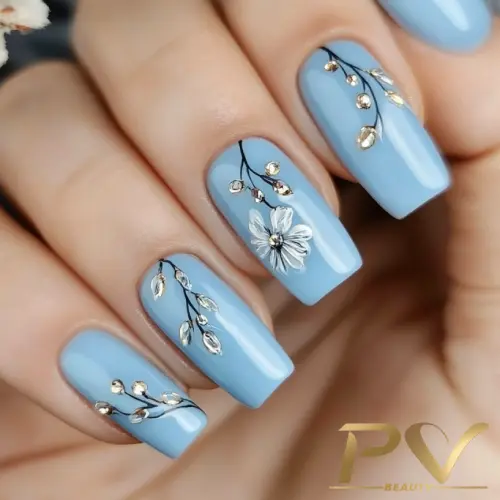 Unhas Azul Pastel com Flores Delicadas em Relevo: Romantismo em Destaque - inspiração